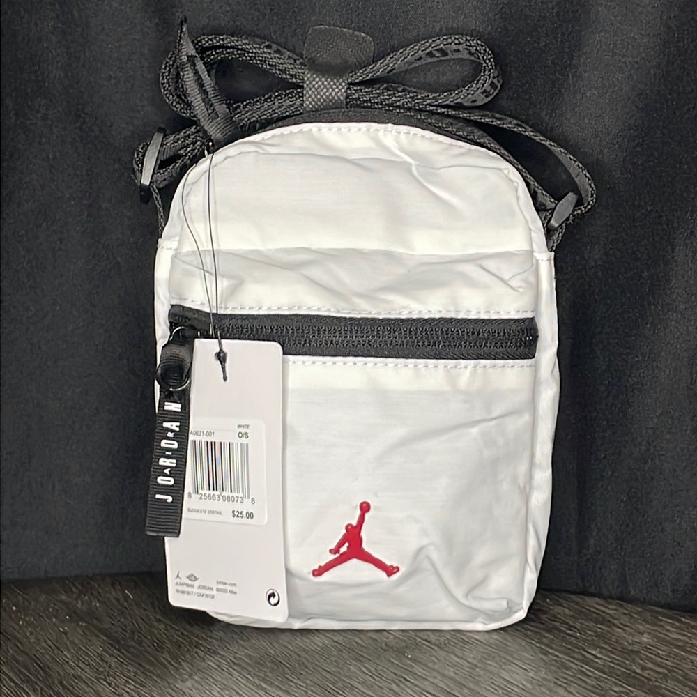 red on white air jordan bag the size of a tablet